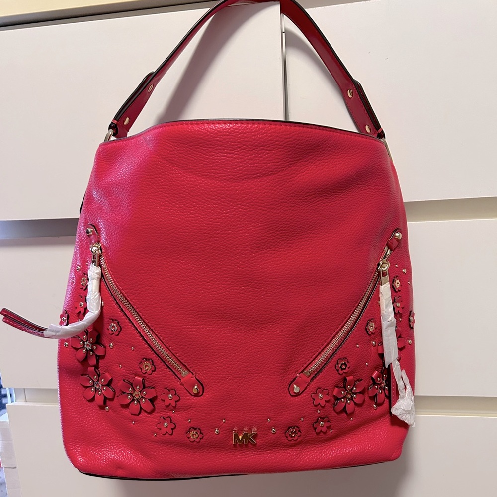 Michael Kors Evie hobo bag in deep pink with floral embellishments. NWT